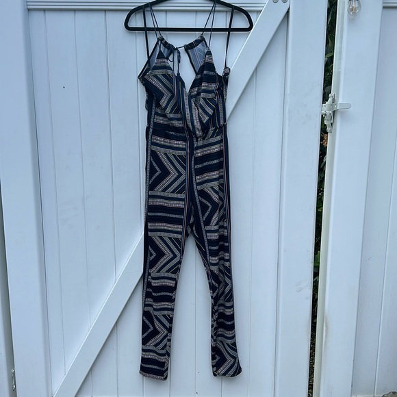 Stylish jumpsuit, adjustable straps, open bag, forgiving material, negotiable - Picture 1 of 7